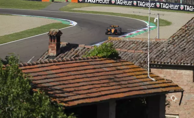 McLaren driver Oscar Piastri of Australia in action during the second free practice at the Enzo and Dino Ferrari racetrack, ahead the Italy's Emilia Romagna Formula One Grand Prix, in Imola, Italy, Friday, May 16, 2025. (AP Photo/Antonio Calanni)
