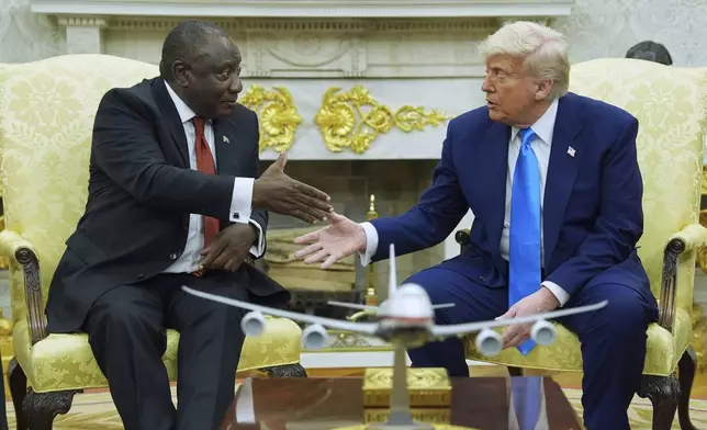 President Donald Trump meets South African President Cyril Ramaphosa in the Oval Office of the White House, Wednesday, May 21, 2025, in Washington. (AP Photo/Evan Vucci)