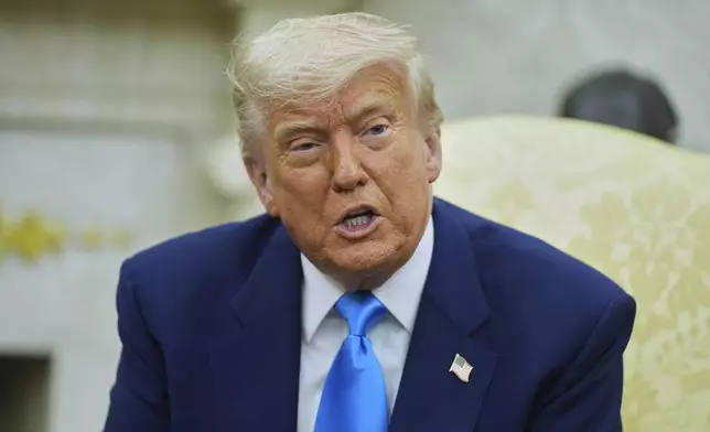 President Donald Trump speaks as he meets with South African President Cyril Ramaphosa in the Oval Office of the White House, Wednesday, May 21, 2025, in Washington. (AP Photo/Evan Vucci)