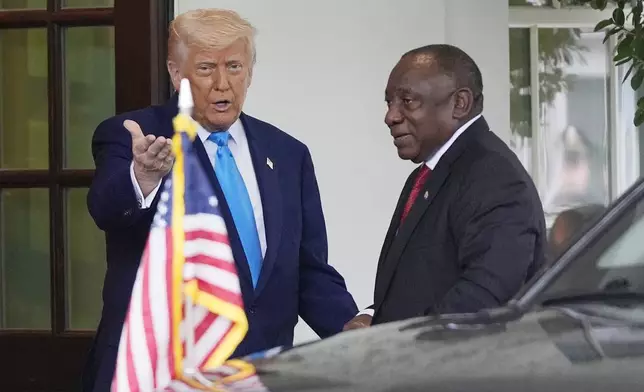 President Donald Trump greets South African President Cyril Ramaphosa at the White House, Wednesday, May 21, 2025, in Washington. (AP Photo/Julia Demaree Nikhinson)
