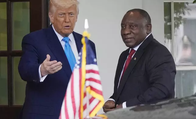President Donald Trump greets South African President Cyril Ramaphosa at the White House, Wednesday, May 21, 2025, in Washington. (AP Photo/Julia Demaree Nikhinson)