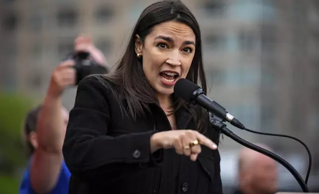 Rep. Alexandria Ocasio-Cortez (D-N.Y.) speaks at the NYCLU's May Day rally for worker's and immigrants rights at Foley Square, Thursday, May 1, 2025, in New York. (AP Photo/Angelina Katsanis)