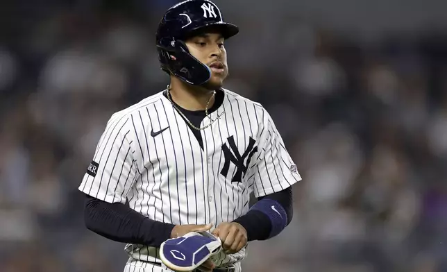 New York Yankees' Jorbit Vivas reacts after being walked during the fifth inning of a baseball game against the Tampa Bay Rays, Friday, May 2, 2025, in New York. (AP Photo/Adam Hunger)