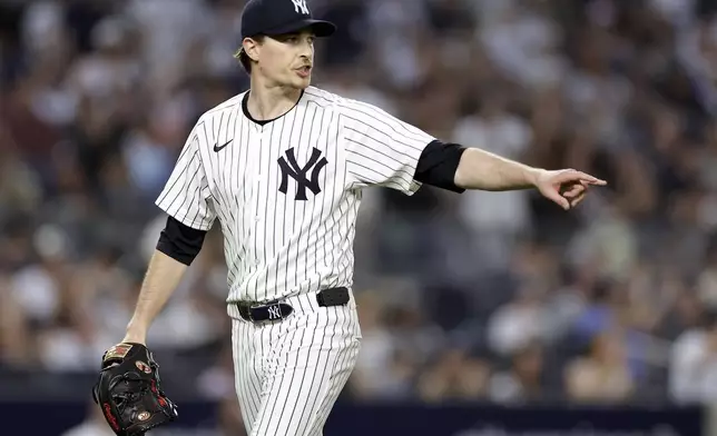 New York Yankees pitcher Max Fried reacts after the last out of the third inning of a baseball game against the Tampa Bay Rays, Friday, May 2, 2025, in New York. (AP Photo/Adam Hunger)