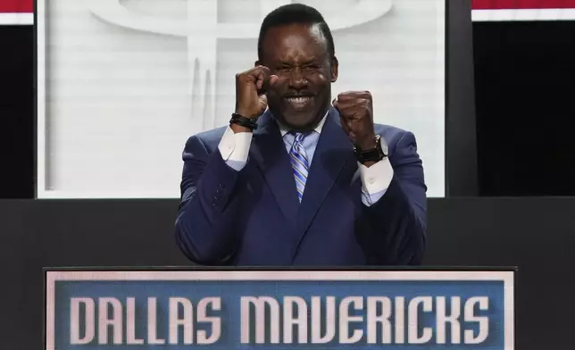 Dallas Mavericks' Rolando Blackman celebrates after NBA Deputy Commissioner Mark Tatum announced that the Mavericks won the first pick in the NBA basketball draft lottery in Chicago, Monday, May 12, 2025. (AP Photo/Nam Y. Huh)
