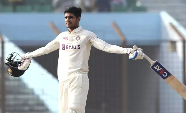 FILE -India's Shubman Gill celebrates after scoring a century during the third day of the first Test cricket match between Bangladesh and India in Chattogram Bangladesh, Dec. 16, 2022. (AP Photo/Surjeet Yadav, File)