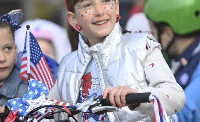 Leigton Pearce, 8, of Westmont participates in a Memorial Day bicycle contest in Johnstown, Pa., Monday, May 26, 2025. (John Rucosky/The Tribune-Democrat via AP)