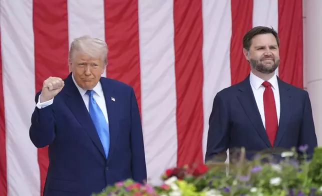 President Donald Trump and Vice President JD Vance attend the 157th National Memorial Day Observance at Arlington National Cemetery, Monday, May 26, 2025, in Arlington, Va. (AP Photo/Jacquelyn Martin)