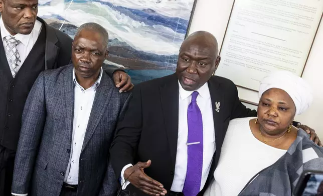 Civil-rights attorney Ben Crump holds a press conference with friends and family of Patrick Lyoya after former Grand Rapids police officer Christopher Schurr testified during the fifth day of his trial at the Kent County Courthouse in Grand Rapids, Mich., Friday, May 2, 2025. (Joel Bissell/Kalamazoo Gazette via AP)