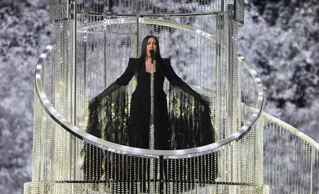 Yuval Raphael from Israel performs the song "New Day Will Rise" during the Grand Final of the 69th Eurovision Song Contest, in Basel, Switzerland, Saturday, May 17, 2025. (AP Photo/Martin Meissner)