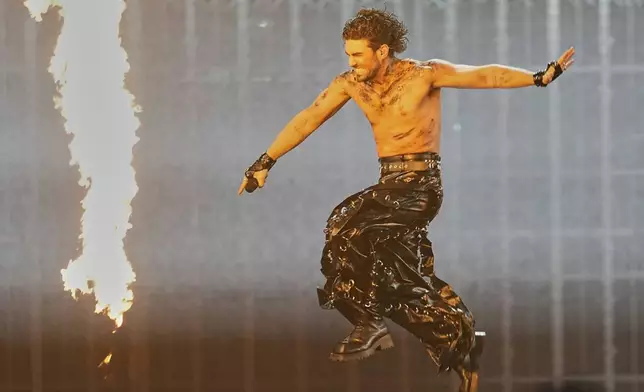 PARG from Armenia performs the song "SURVIVOR" during the Grand Final of the 69th Eurovision Song Contest, in Basel, Switzerland, Saturday, May 17, 2025. (AP Photo/Martin Meissner)