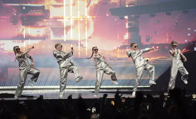 VAEB from Iceland performs the song "ROA" during the Grand Final of the 69th Eurovision Song Contest, in Basel, Switzerland, Saturday, May 17, 2025. (AP Photo/Martin Meissner)