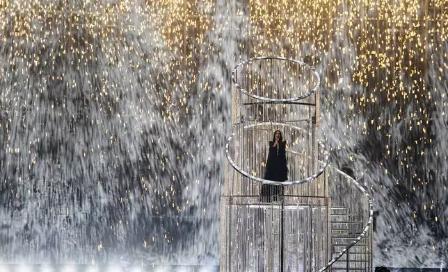 Yuval Raphael from Israel performs the song "New Day Will Rise" during the Grand Final of the 69th Eurovision Song Contest, in Basel, Switzerland, Saturday, May 17, 2025. (AP Photo/Martin Meissner)