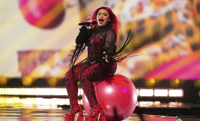Miriana Conte from Malta performs the song "SERVING" during the Grand Final of the 69th Eurovision Song Contest, in Basel, Switzerland, Saturday, May 17, 2025. (AP Photo/Martin Meissner)