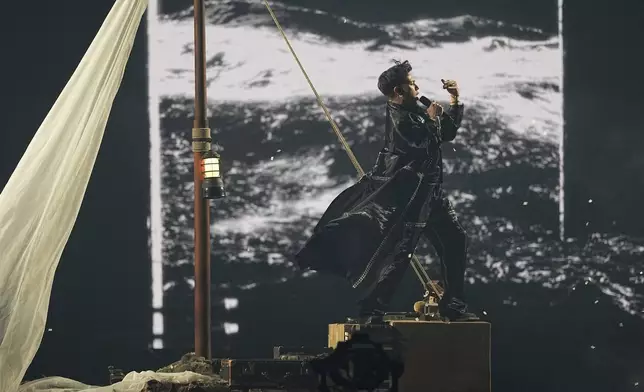 JJ from Austria performs the song "Wasted Love" during the dress rehearsal for the Grand Final of the 69th Eurovision Song Contest, in Basel, Switzerland, Friday, May 16 2025. (AP Photo/Martin Meissner)