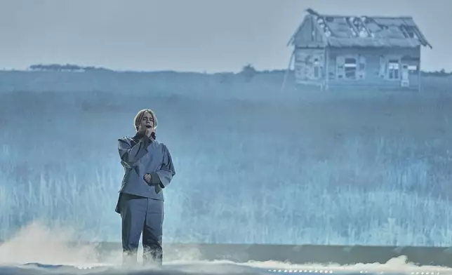 Katarsis from Lithuania performs the song "Tavo Akys" during the Grand Final of the 69th Eurovision Song Contest, in Basel, Switzerland, Saturday, May 17, 2025. (AP Photo/Martin Meissner)