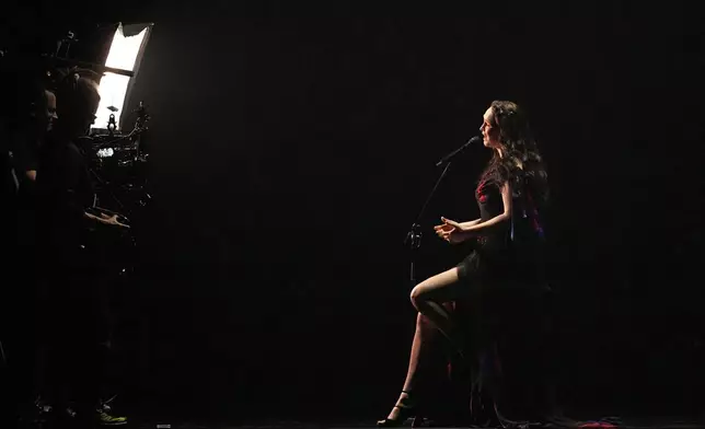 Zoe Me from Switzerland performs the song "Voyage" during the Grand Final of the 69th Eurovision Song Contest, in Basel, Switzerland, Saturday, May 17, 2025. (AP Photo/Martin Meissner)