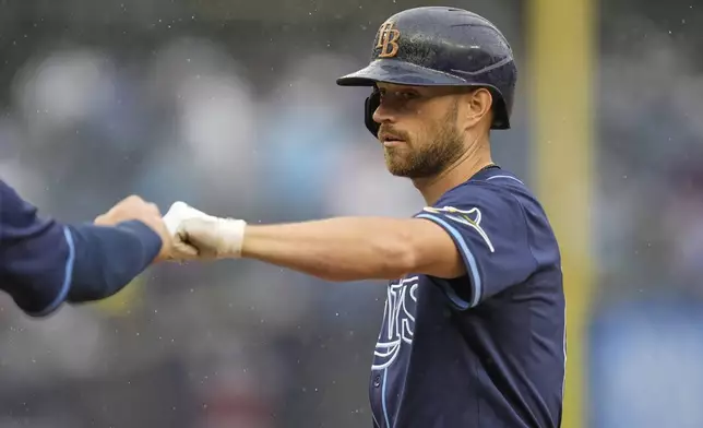 Tampa Bay Rays' Brandon Lowe celebrates after hitting a two-run single during the fourth inning of a baseball game against the New York Yankees, Sunday, May 4, 2025, in New York. (AP Photo/Seth Wenig)