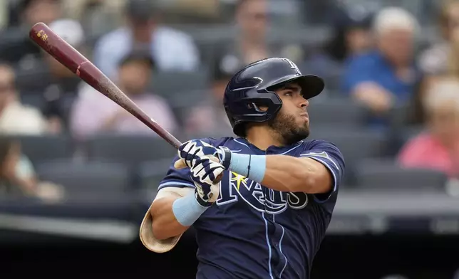 Tampa Bay Rays' Jonathan Aranda looks after a solo home run during the third inning of a baseball game against the New York Yankees, Sunday, May 4, 2025, in New York. (AP Photo/Seth Wenig)