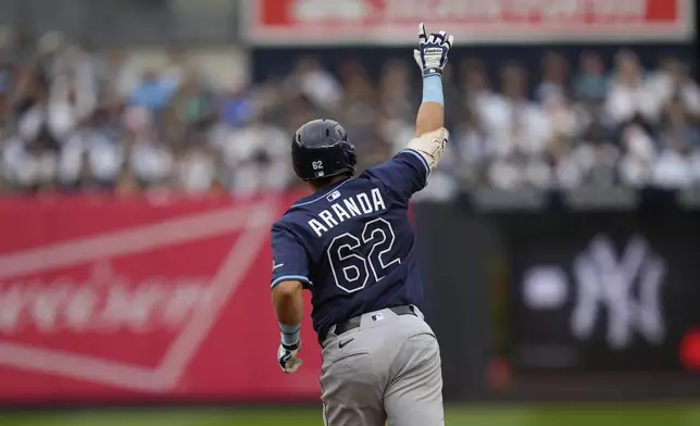 Tampa Bay Rays' Jonathan Aranda reacts after hitting a solo home run during the third inning of a baseball game against the New York Yankees, Sunday, May 4, 2025, in New York. (AP Photo/Seth Wenig)