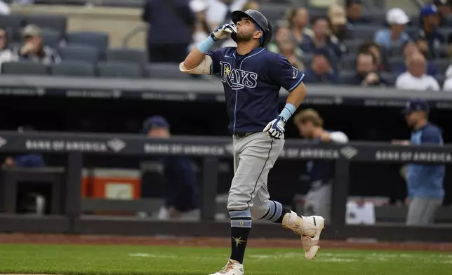 Tampa Bay Rays' Jonathan Aranda reacts after hitting a solo home run during the third inning of a baseball game against the New York Yankees, Sunday, May 4, 2025, in New York. (AP Photo/Seth Wenig)