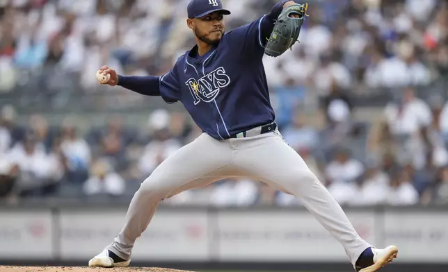Tampa Bay Rays pitcher Taj Bradley throws during the second inning of a baseball game against the New York Yankees, Sunday, May 4, 2025, in New York. (AP Photo/Seth Wenig)