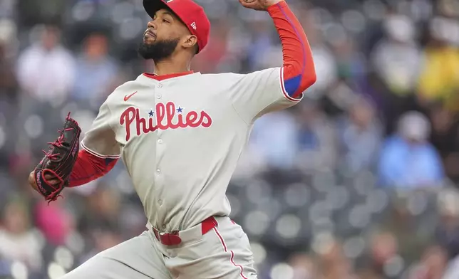 Philadelphia Phillies starting pitcher Cristopher Sánchez works against the Colorado Rockies in the first inning of a baseball game Monday, May 19, 2025, in Denver. (AP Photo/David Zalubowski)