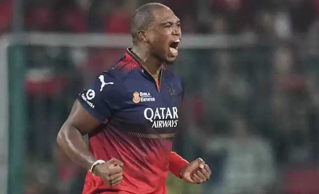Royal Challengers Bengaluru's Lungi Ngidi celebrates the dismissal of Chennai Super Kings Dewald Brevis during the Indian Premier League cricket match between Royal Challengers Bengaluru and Chennai Super Kings at Chinnaswamy Stadium in Bengaluru, India, Saturday, May 3, 2025. (AP Photo/Aijaz Rahi)