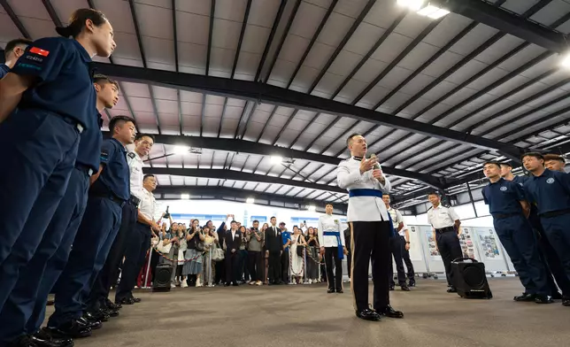 Commissioner of Police inspects passing-out parade of Police Cadet Training at HK Police College  Source: HKSAR Government Press Releases