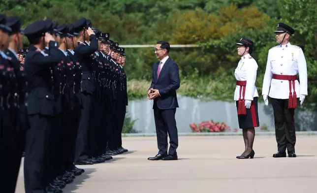 Chairman of Hong Kong Jockey Club reviews Fire Services passing-out parade  Source: HKSAR Government Press Releases