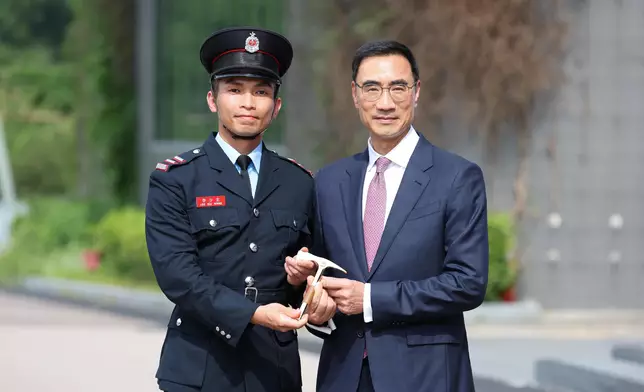 Chairman of Hong Kong Jockey Club reviews Fire Services passing-out parade  Source: HKSAR Government Press Releases