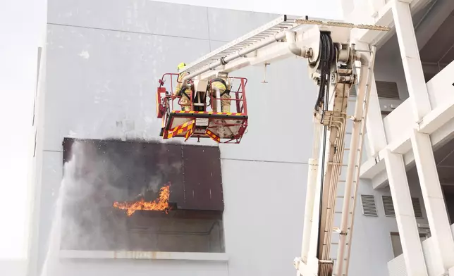 Chairman of Hong Kong Jockey Club reviews Fire Services passing-out parade  Source: HKSAR Government Press Releases
