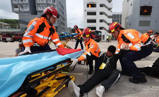 Chairman of Hong Kong Jockey Club reviews Fire Services passing-out parade  Source: HKSAR Government Press Releases