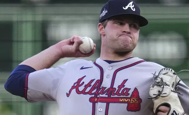 Atlanta Braves pitcher Bryce Elder delivers during the first inning of a baseball game against the Pittsburgh Pirates in Pittsburgh, Friday, May 9, 2025. (AP Photo/Gene J. Puskar)
