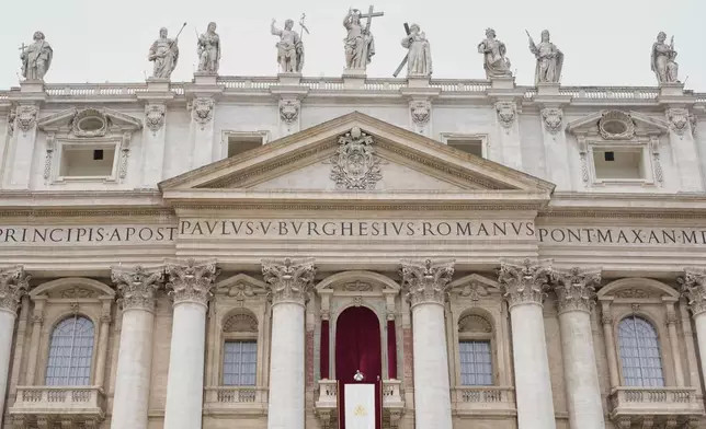 Pope Leo XIV appears at the central balcony of St. Peter's Basilica for his first Sunday blessing after his election, in St. Peter's Square at the Vatican, Sunday, May 11, 2025.(AP Photo/Gregorio Borgia)