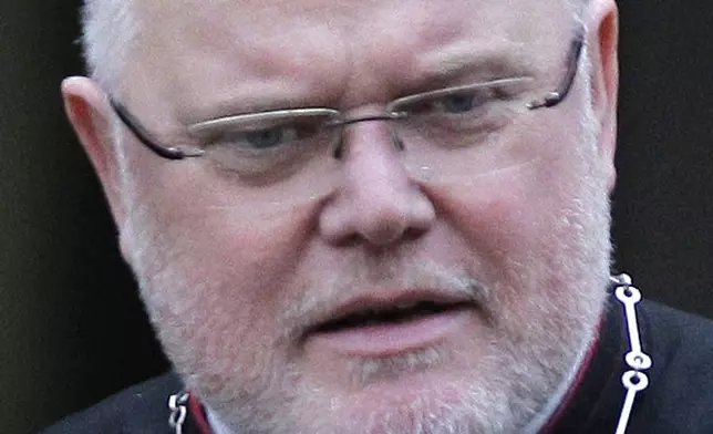 FILE - Munich Archbishop and Freising Reinhard Marx is seen prior to a meeting of cardinals for a day of reflection at the Vatican, Nov. 19, 2010. (AP Photo/Alessandra Tarantino, File)