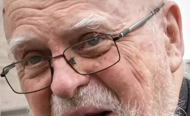 FILE - Swedish Cardinal Anders Arborelius is approached by reporters as he arrives for a College of Cardinals meeting at the Vatican, Monday, April 28, 2025. (AP Photo/Gregorio Borgia, File)