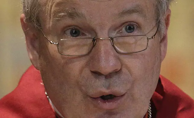 FILE - Cardinal Cristoph Schoenborn attends a celebration at St. Bartholomew Church at the Tiberine Island in Rome, March 4, 2013. (AP Photo/Riccardo De Luca, File)