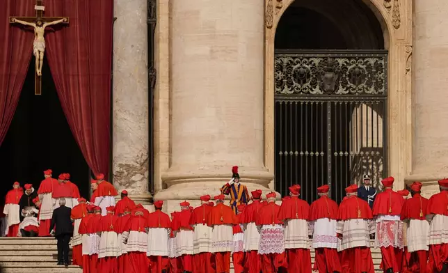 FILE - Cardinals walk through St. Peter's Square ahead of Pope Francis' coffin at the Vatican, Wednesday, April 23, 2025. (AP Photo/Andreea Alexandru, File)