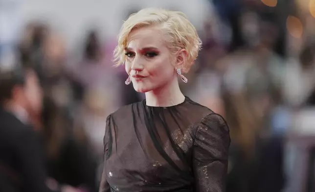 CORRECTED NAME SPELLING - Julia Garner poses for photographers during the opening ceremony red carpet of the 78th international film festival, Cannes, southern France, Tuesday, May 13, 2025. (Photo by Joel C Ryan/Invision/AP)