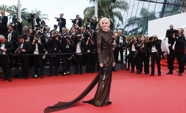 CORRECTED NAME SPELLING - Julia Garner poses for photographers during the opening ceremony red carpet of the 78th international film festival, Cannes, southern France, Tuesday, May 13, 2025. (Photo by Joel C Ryan/Invision/AP)