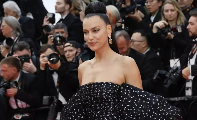 Irina Shayk poses for photographers during the opening ceremony red carpet of the 78th international film festival, Cannes, southern France, Tuesday, May 13, 2025. (Photo by Joel C Ryan/Invision/AP)