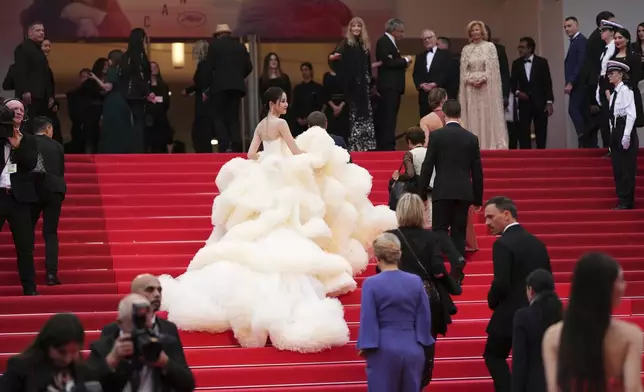 Wan QianHui poses for photographers during the opening ceremony red carpet of the 78th international film festival, Cannes, southern France, Tuesday, May 13, 2025. (Photo by Scott A Garfitt/Invision/AP)