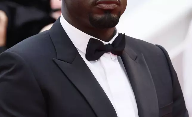 Daniel Kaluuya poses for photographers during the opening ceremony red carpet of the 78th international film festival, Cannes, southern France, Tuesday, May 13, 2025. (Photo by Joel C Ryan/Invision/AP)