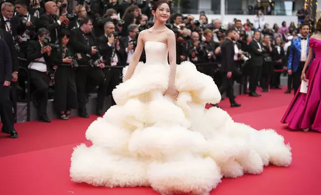 Wan QianHui poses for photographers during the opening ceremony red carpet of the 78th international film festival, Cannes, southern France, Tuesday, May 13, 2025. (Photo by Scott A Garfitt/Invision/AP)