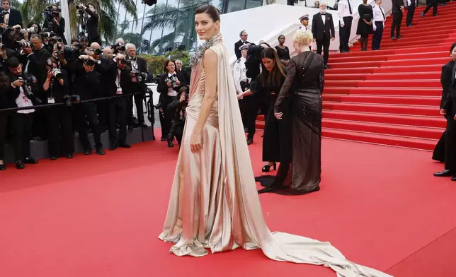 Isabeli Fontana poses for photographers during the opening ceremony red carpet of the 78th international film festival, Cannes, southern France, Tuesday, May 13, 2025. (Photo by Joel C Ryan/Invision/AP)