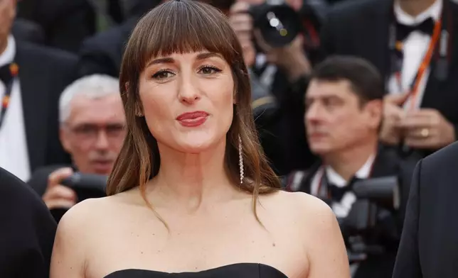 Juliette Armanet poses for photographers during the opening ceremony red carpet of the 78th international film festival, Cannes, southern France, Tuesday, May 13, 2025. (Photo by Joel C Ryan/Invision/AP)