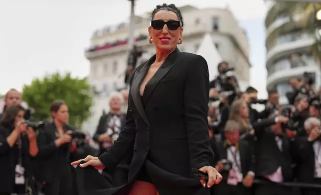 Rossy de Palma poses for photographers during the opening ceremony red carpet of the 78th international film festival, Cannes, southern France, Tuesday, May 13, 2025. (AP Photo/Natacha Pisarenko)