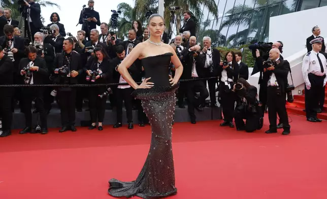 Shanina Shaik poses for photographers during the opening ceremony red carpet of the 78th international film festival, Cannes, southern France, Tuesday, May 13, 2025. (Photo by Joel C Ryan/Invision/AP)