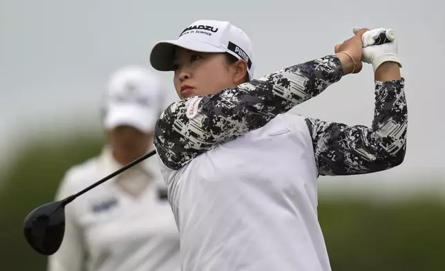 Mao Saigo, of Japan, hits from the 18th tee during the second round of the U.S. Women's Open golf tournament at Erin Hills Friday, May 30, 2025, in Erin, Wis. (AP Photo/Jeff Roberson)